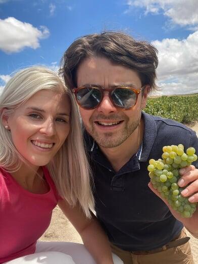 Tanika Paris and Daniele Lenuzza, founders of a boutique winery in South Africa, crafting premium wines.