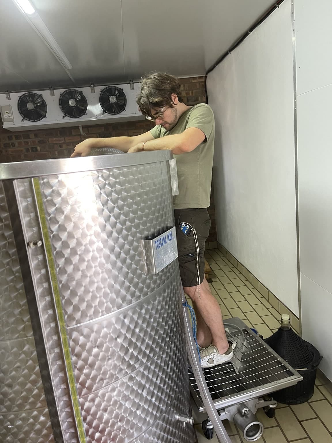 Daniele Lenuzza carefully overseeing the winemaking process at Lenuzza Wines.